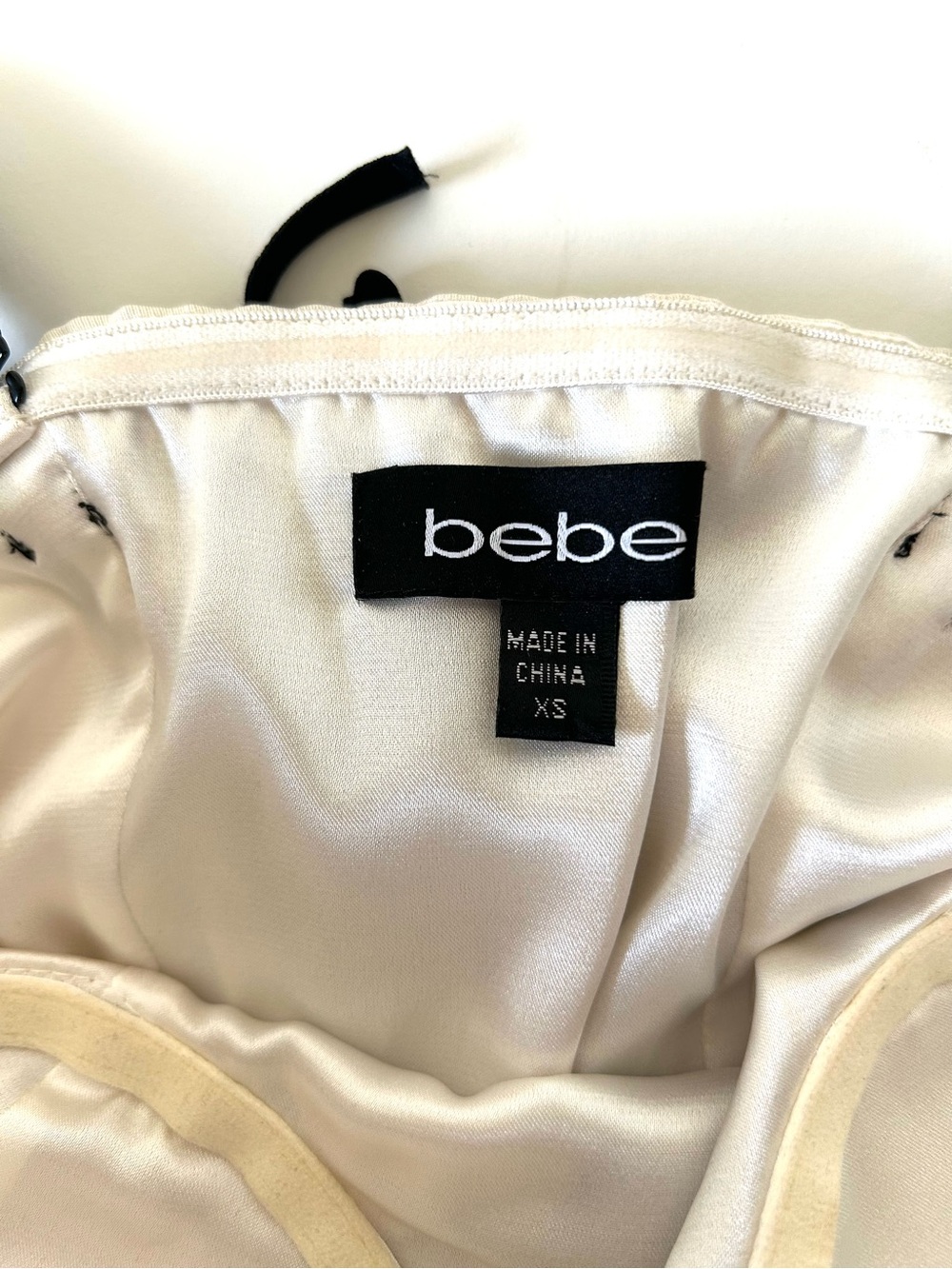 bebe Cream Strapless Satin Top with Black Brand Tag - Picture 8 of 10